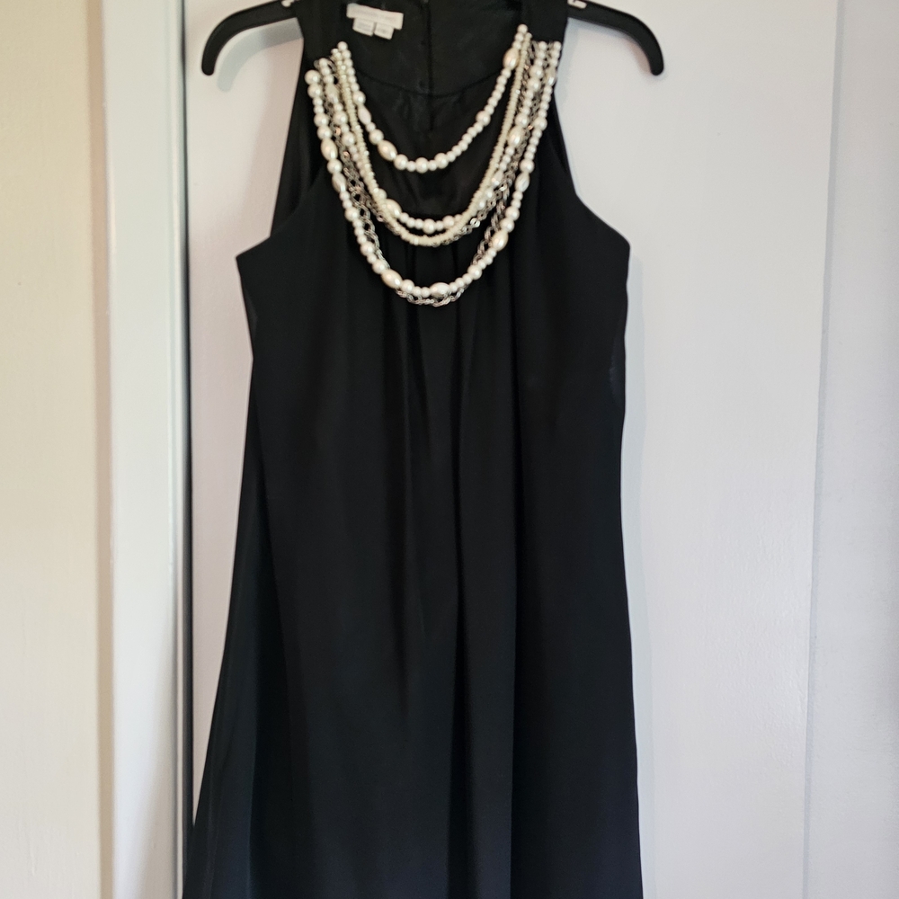 Chic Black Dress with Beaded Necklace